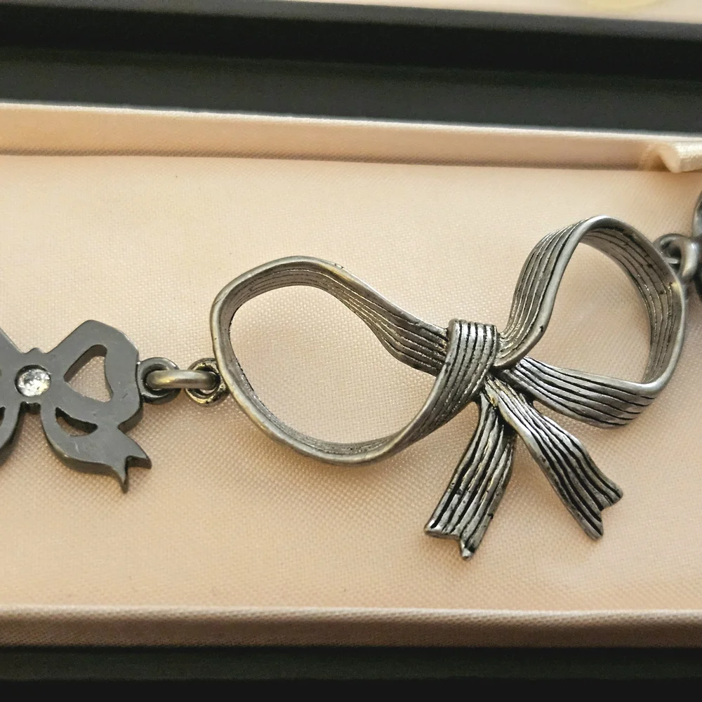Juicy Couture Silver Bow Charm Bracelet - Picture 3 of 7
